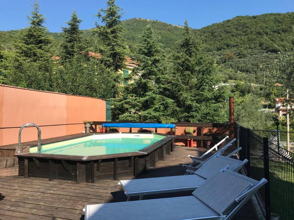 Casa Ginni Con Piscina E Giardino Caravonica Bagian luar foto