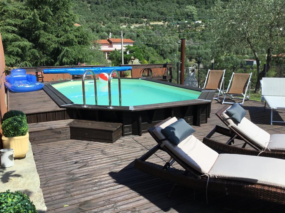 Casa Ginni Con Piscina E Giardino Caravonica Bagian luar foto