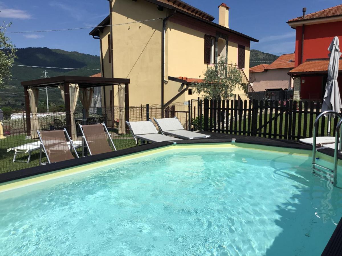 Casa Ginni Con Piscina E Giardino Caravonica Bagian luar foto