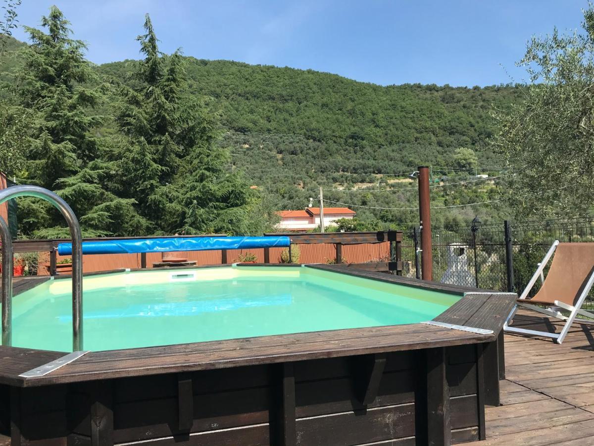 Casa Ginni Con Piscina E Giardino Caravonica Bagian luar foto